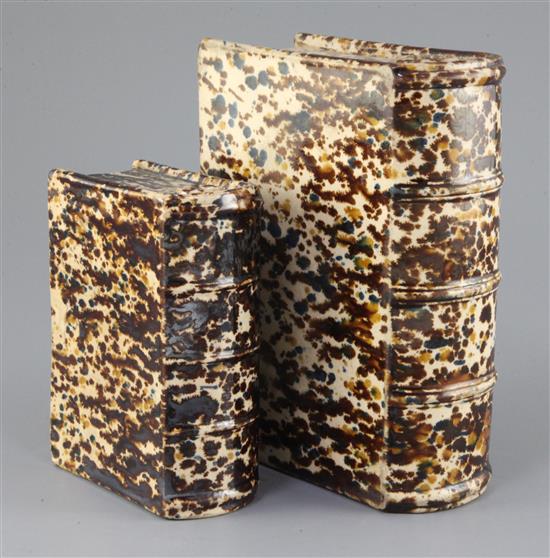 Americana. Two brown ochre and blue mottled glaze stoneware book flasks, probably Bennington, Vermont, mid 19thc entury 20 & 14cm, some